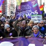 Demonstrators shout slogans as they hold flags, placards and a banner during the "March for Change" planned by left-wing party Podemos that emerged out of the "Indignants" movement, in Madrid on January 31, 2015. Tens of thousands of people took to the streets in Madrid today in support of a call for change from new anti-austerity party Podemos, a week after Greece elected its ally Syriza. AFP PHOTO/ GERARD JULIEN (Photo credit should read GERARD JULIEN/AFP/Getty Images)