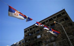 Serbian flags are seen near the main bridge in the ethnically divided town of Mitrovica